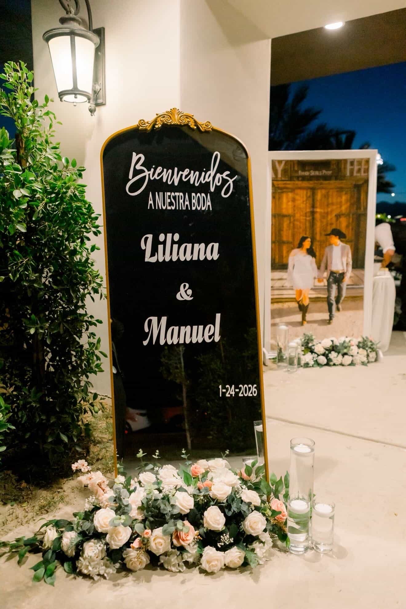 Elegant wedding welcome sign with roses at the entrance of a Rancho Escondido reception in Indio.